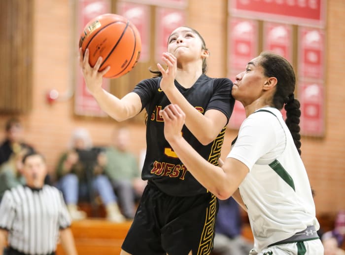 Jasmine Martinez (5) goes to the bucket in an 83-45 win over Maria Carrillo at the Sabrina Ionescu Classic on Jan. 20.